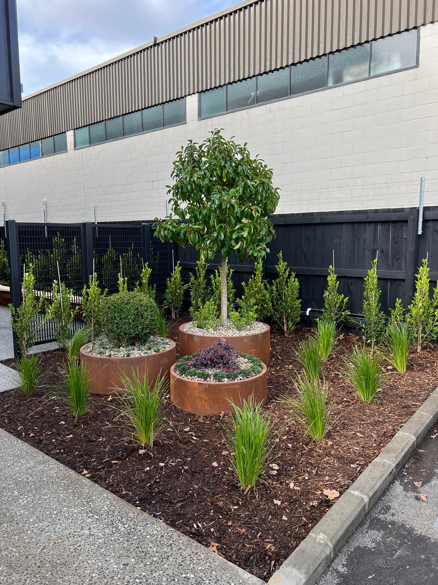 Bottomless Corten Cylinders