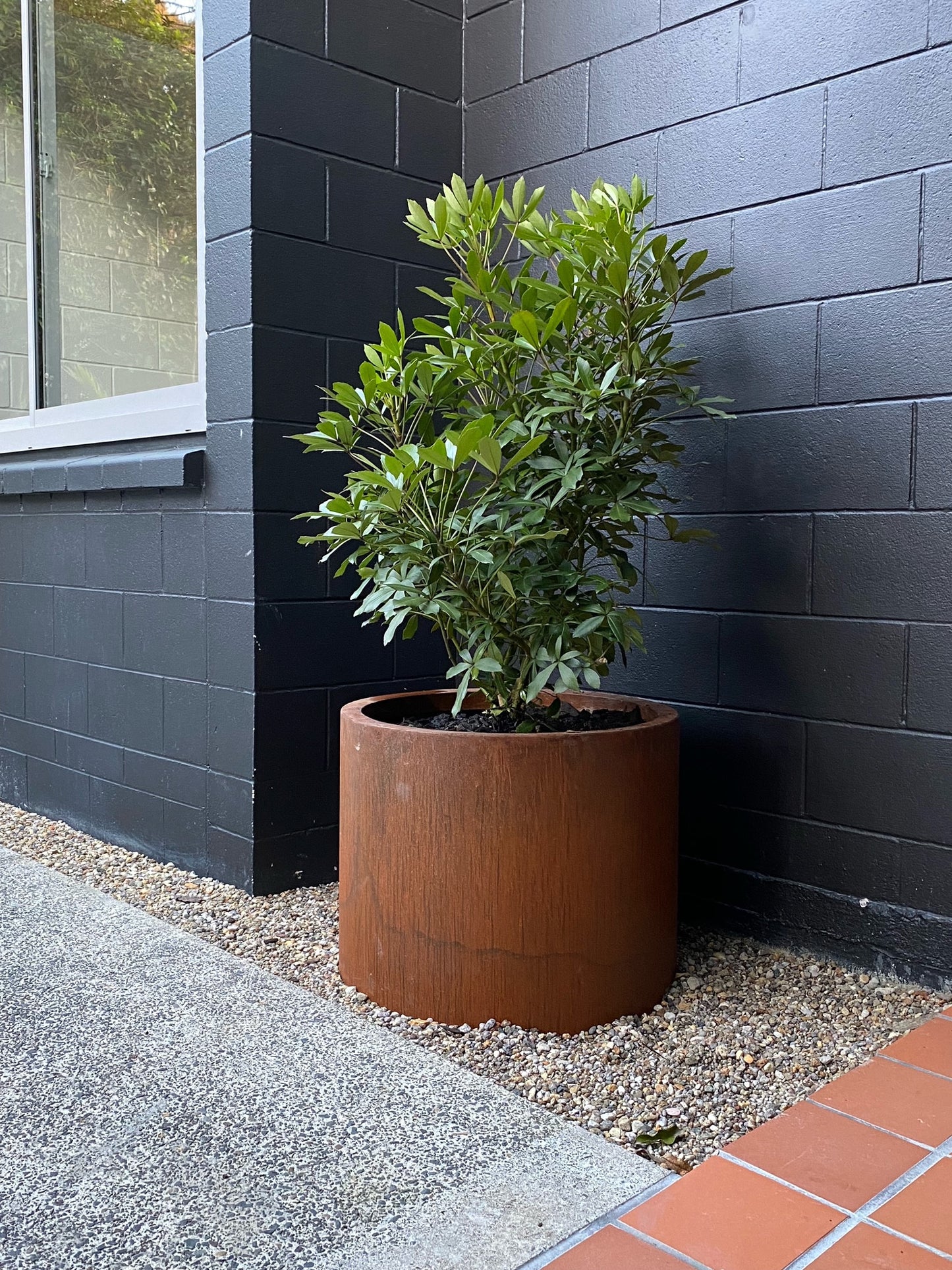 Bottomless Corten Cylinders